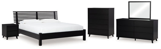 Danziar Queen Panel Bed with Mirrored Dresser, Chest and Nightstand