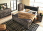 Wynnlow Queen Upholstered Poster Bed