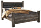 Wynnlow Queen Upholstered Poster Bed